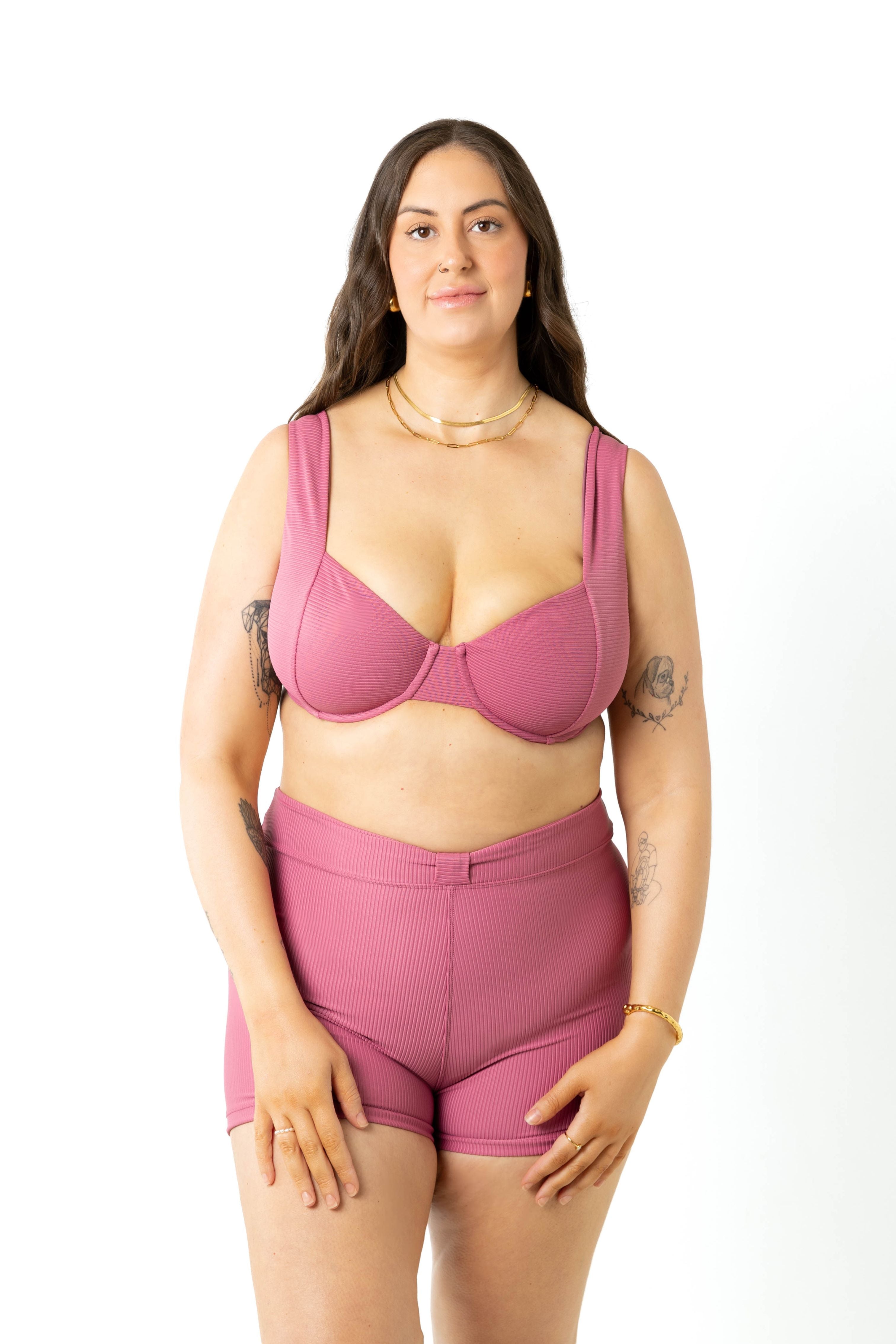 Size 18 model wearing campbell high waisted swim shorts in colour spice and harlow underwire top in colour spice for fuller bust